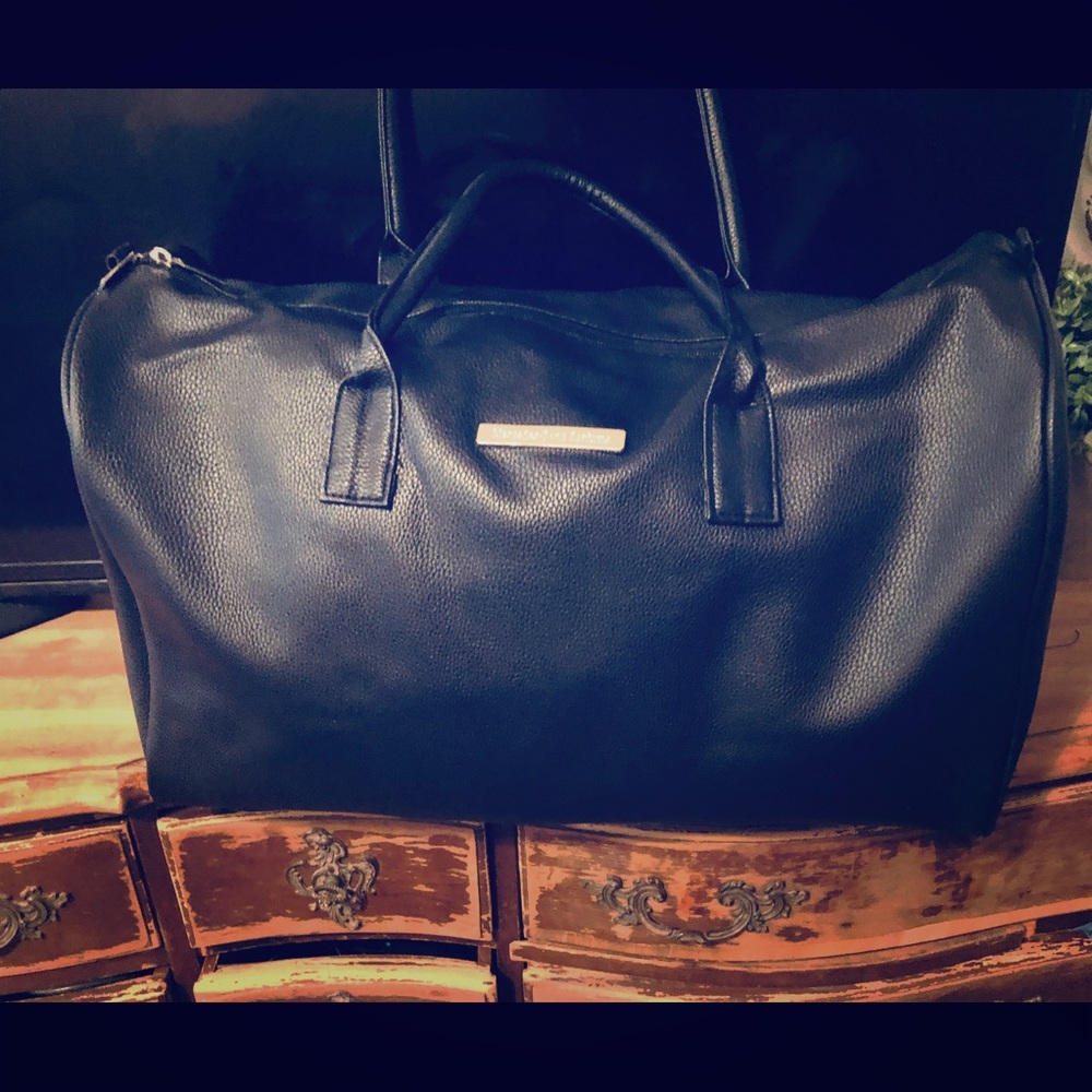 Black leather duffle by Mercedes Benz